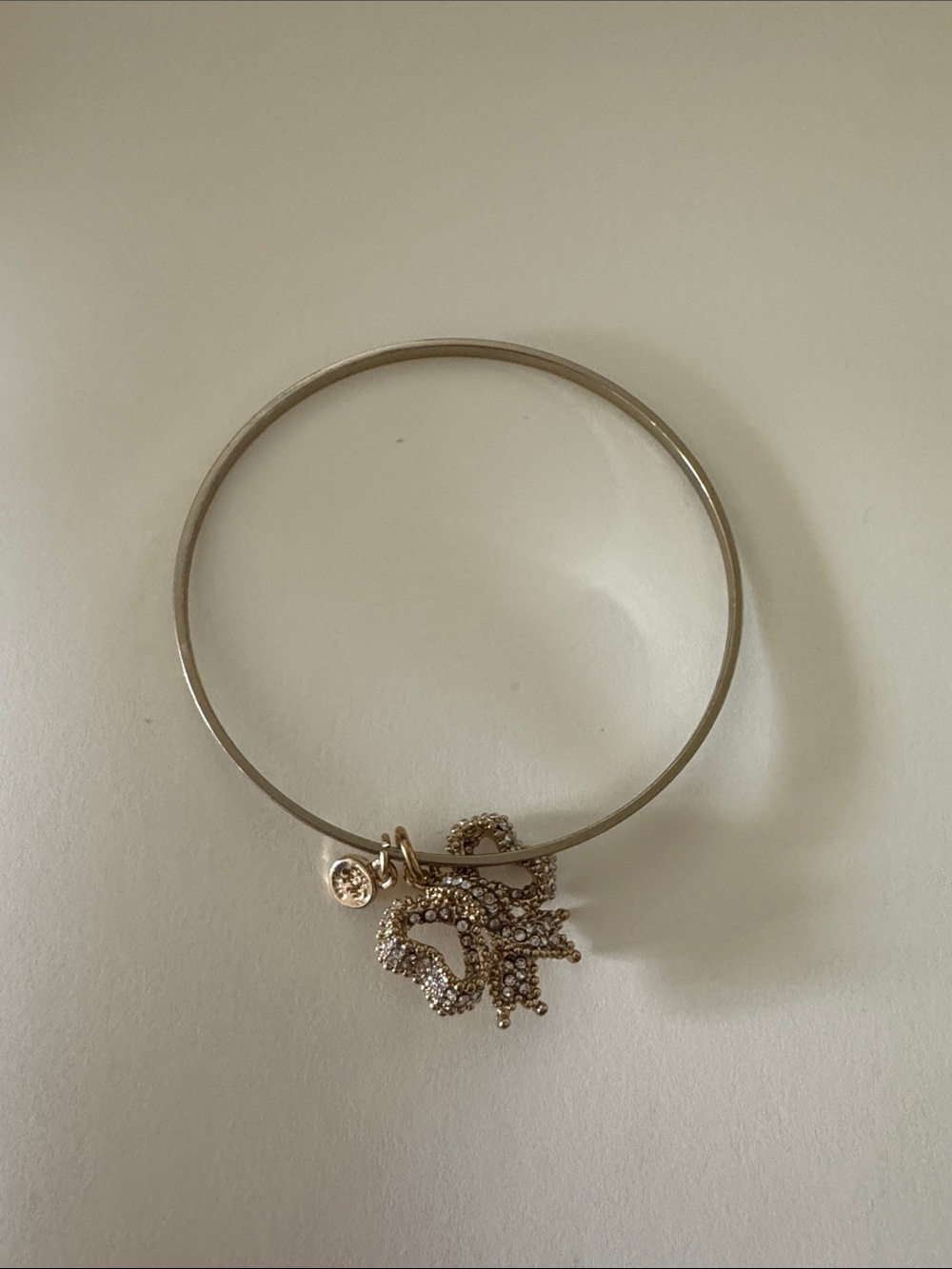 Gold-Tone Bangle Bracelet with Bow